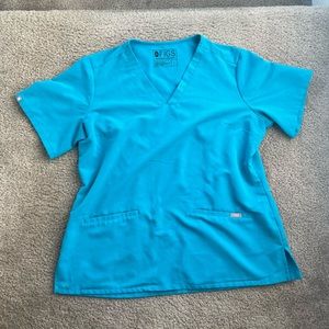 figs limited edition “teal ” set size large.